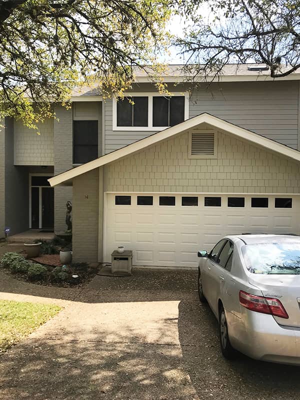 Hardie shingle and lap siding on a two-story home with garage in Austin, TX