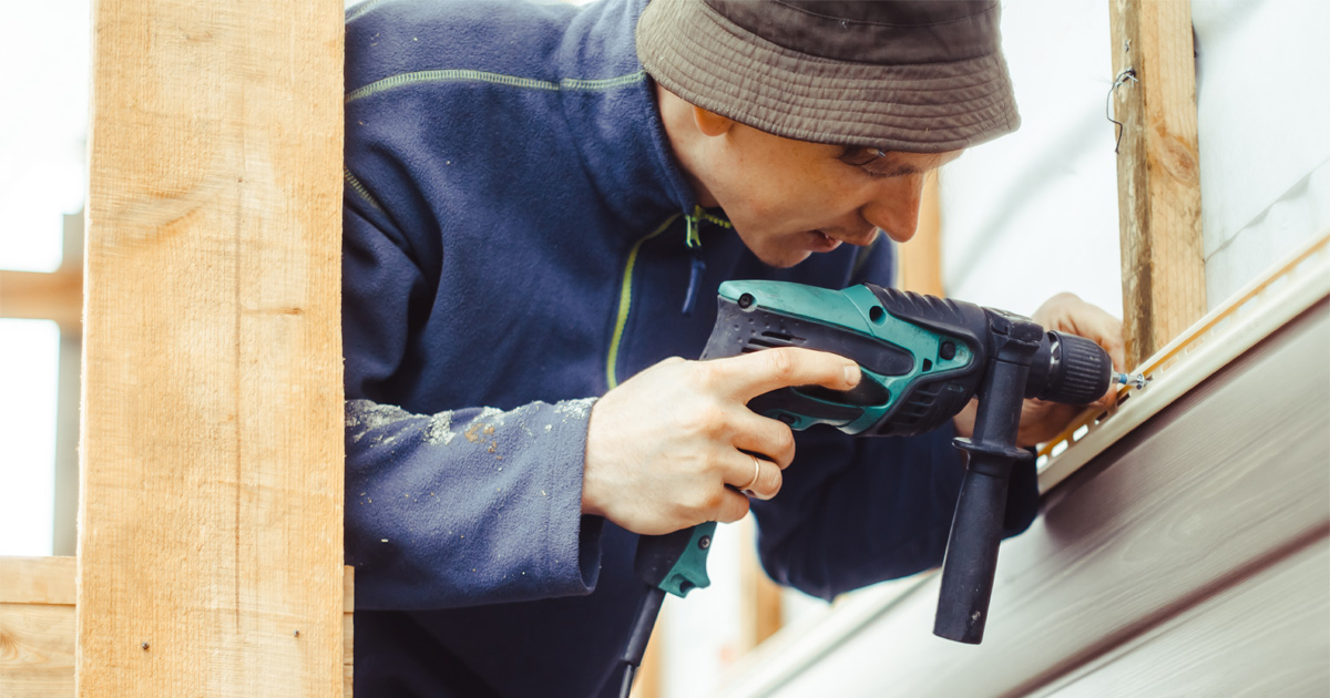 siding installation process showing exterior home upgrade steps
