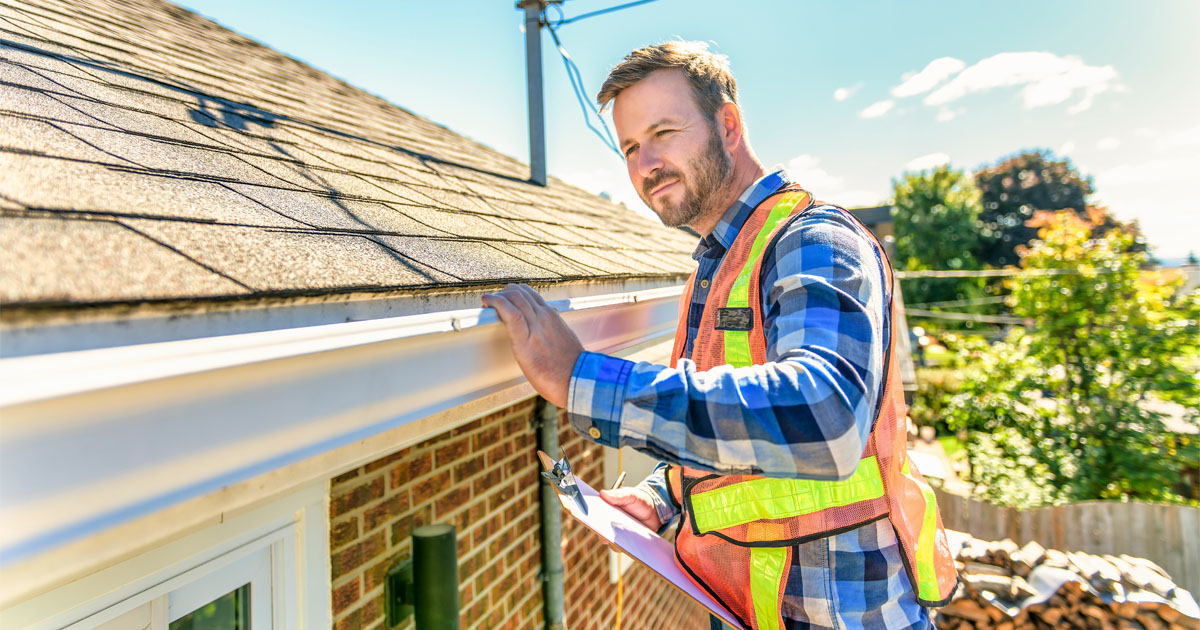 Asphalt Roof Inspection being performed by a roofing professional on a residential home