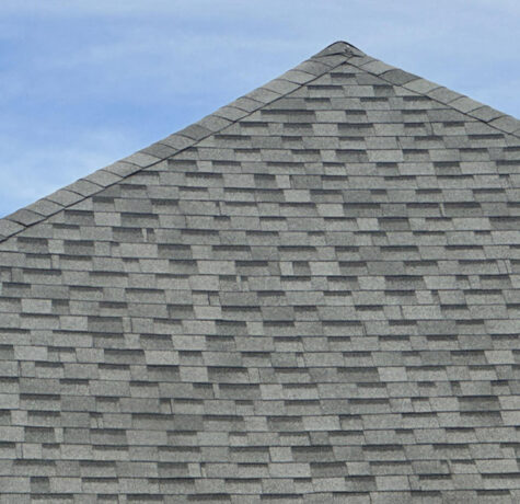 Home with Asphalt Roofing Shingles installed to improve durability and curb appeal
