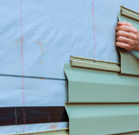 Lap Siding Installation on a residential home by professional contractors